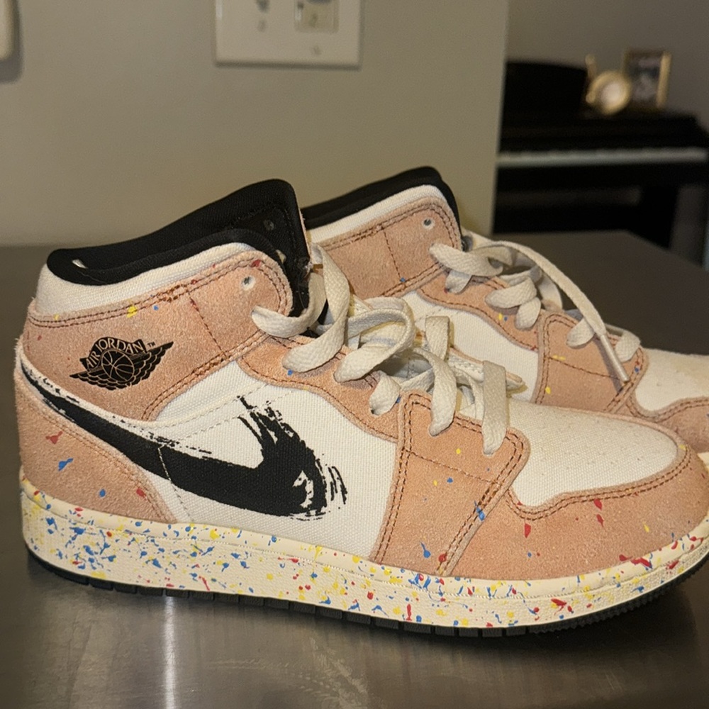 Paint splattered tan air Jordan 1’s for women